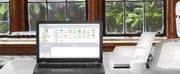 laptop-running-design-database-transfer-with-brother-stellaire-innov-is-xe2-embroidery-machine-side-view
