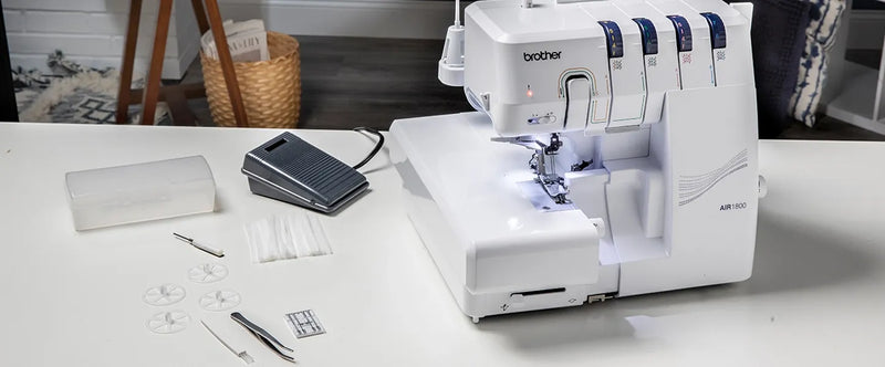 brother-air1800-air-serger-front-view-infographic-highlighting-color-coded-thread-guides