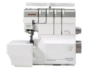 Janome AirThread 2000D Professional overlocker shown fully assembled with the included extra-wide extension table attached.