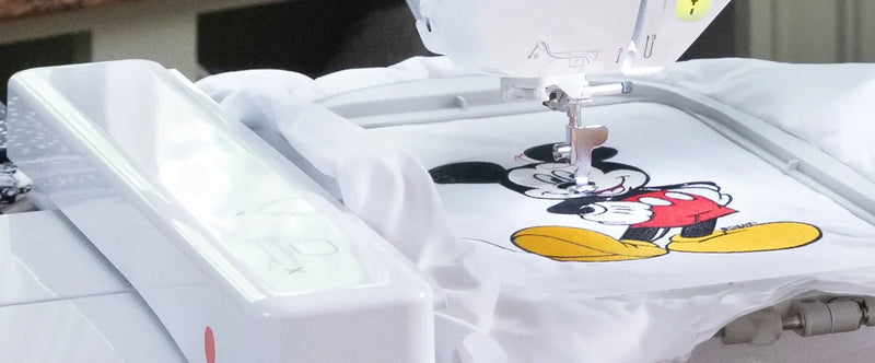 brother-innov-is-nq3700d-sewing-and-embroidery-machine-close-up-of-mickey-mouse-embroidery-on-white-fabric
