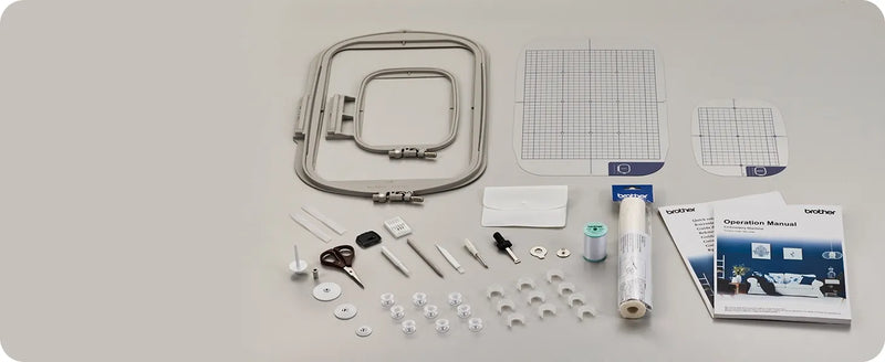 overhead-view-brother-celeste-innov-is-cx1e-embroidery-machine-accessories-kit-including-hoops-and-operation-manual
