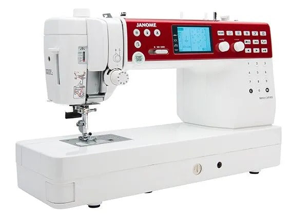Janome Memory Craft 6650 computerized flatbed sewing and quilting machine