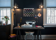 brother-innov-is-ns2850d-combo-sewing-embroidery-machine-centered-on-gray-craft-desk-in-studio-room