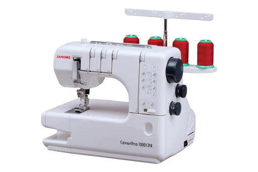 The Janome CoverPro 1000CPX configured with the free arm exposed for sewing cuffs and sleeves.