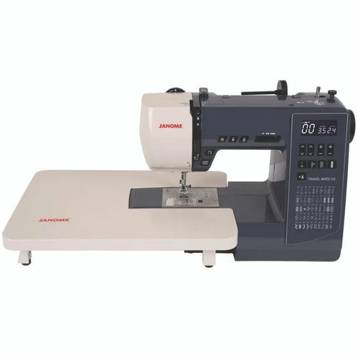 anome TravelMate 50 computerized sewing and quilting machine front view displaying control panel buttons.
