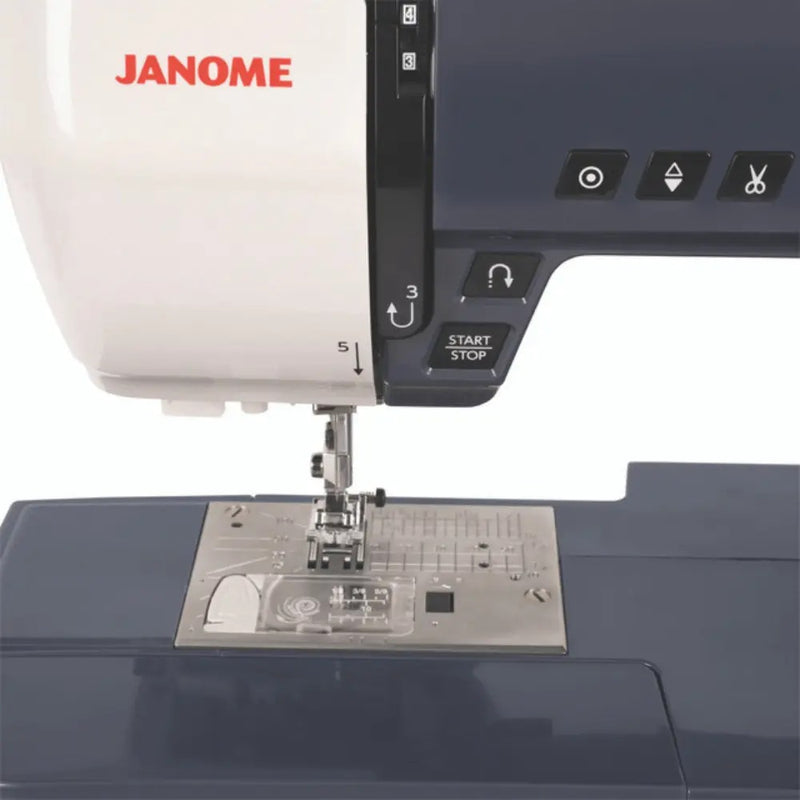 anome TravelMate 50 computerized sewing and quilting machine front view displaying control panel buttons.