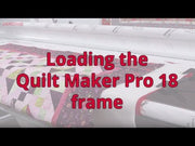 Janome Quilt Maker 18 longarm quilting machine head highlighting the ergonomic handles and LCD touchscreen display.