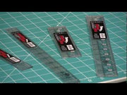 Creative Grids CGR106 one by six inch rectangle acrylic quilt ruler showing black and white lines.