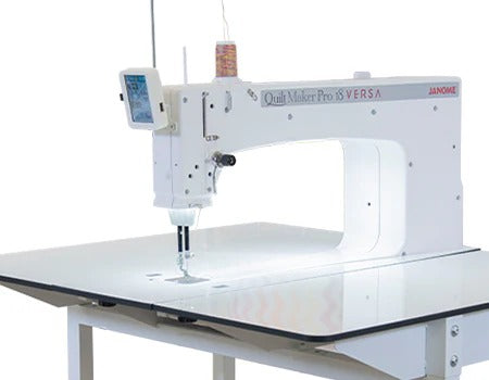 Janome Quilt Maker Pro 20 Versa ST sit-down longarm mounted into the sturdy manually adjustable Regulated Table.