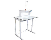 Janome Quilt Maker Pro 20 Versa ST sit-down longarm mounted into the sturdy manually adjustable Regulated Table.