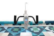 Janome Quilt Maker 15 compact longarm quilting machine head highlighting the LCD monitor and ergonomic handlebars.