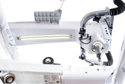 Janome Quilt Maker Pro 20 longarm quilting machine head highlighting the LCD touchscreen and digital tension.