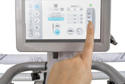 Janome Quilt Maker Pro 20 longarm quilting machine head highlighting the LCD touchscreen and digital tension.