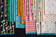1-800-Notion quilting cotton prints by Ruby Star Society featuring scissors, spools, bobbins, ric rac and sewing notions