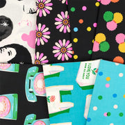 Sparkle Mart fabric detail showing vintage portraits, telephones, shopping bags and colorful dots