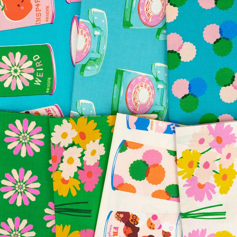 Sparkle Mart fabric detail with bright floral bouquets, retro tins and turquoise telephone prints